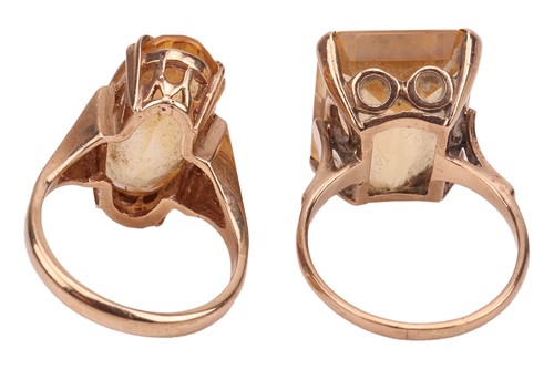 Lot 9 - Two citrine dress rings; to include a...