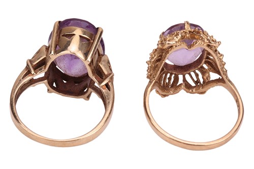 Lot 20 - Two amethyst dress rings in 9ct gold; one in a...