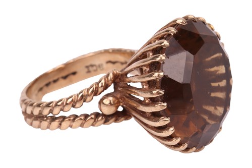 Lot 40 - A smoky quartz cocktail ring, contains a...