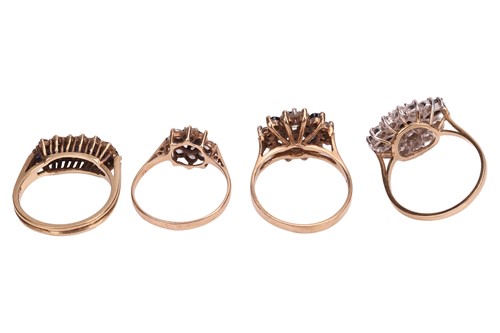 Lot 41 - A collection of four gem-set rings in 9ct gold;...