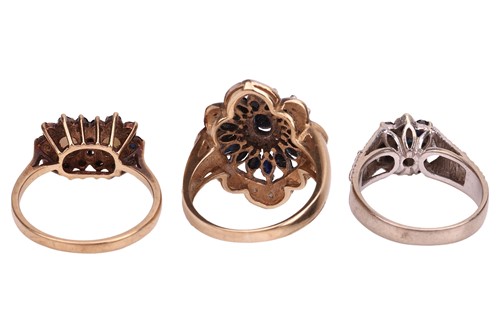Lot 52 - Three gem-set dress rings, each of cluster...