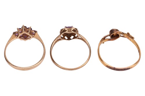 Lot 53 - Three gem-set dress rings including an...