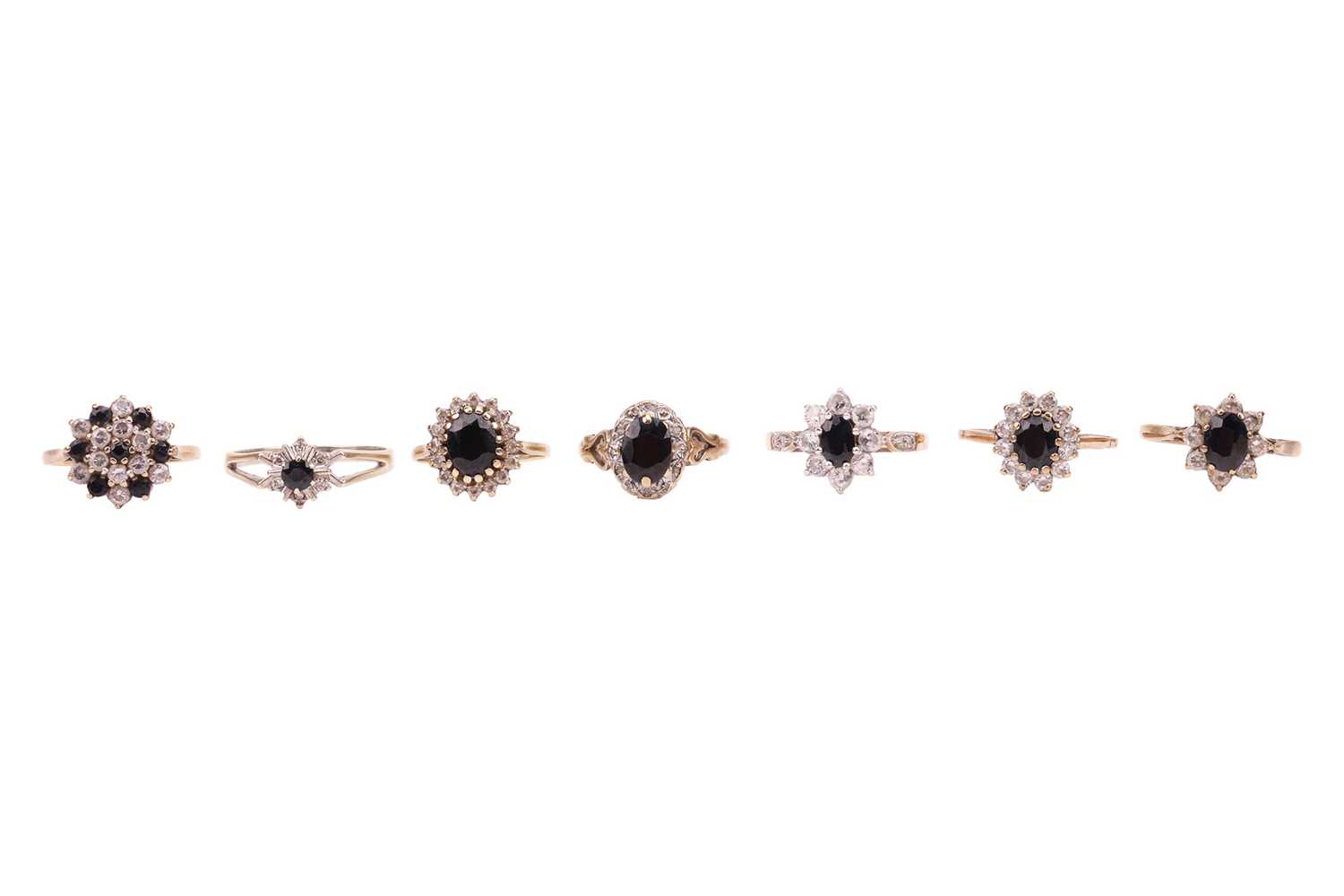 Lot 68 - A group of seven sapphire and cubic zirconia...