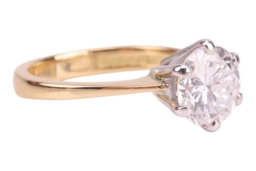 Lot 295 - A diamond solitaire ring in 18ct gold, the...