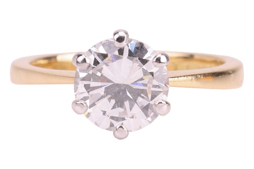 Lot 295 - A diamond solitaire ring in 18ct gold, the...