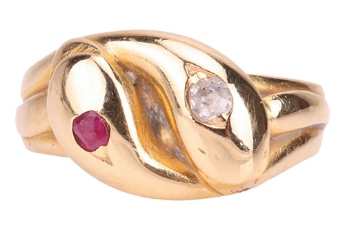 Lot 17 - A Victorian gem-set double snake ring, the...