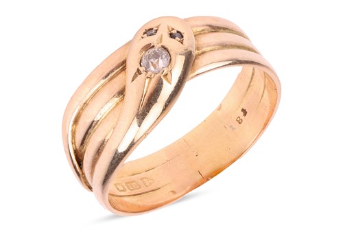 Lot 20 - A Victorian gem-set snake ring, set with an...
