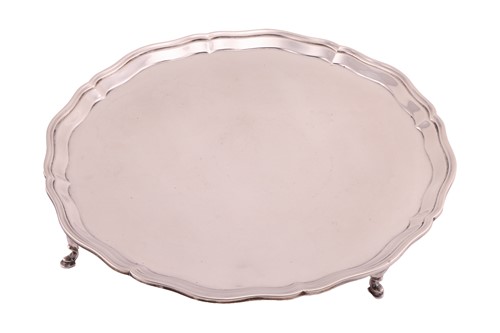 Lot 410 - A large silver salver, Thomas Bradbury & Sons...