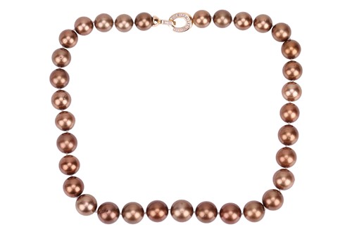 Lot 179 - A treated brown cultured South Sea pearl...