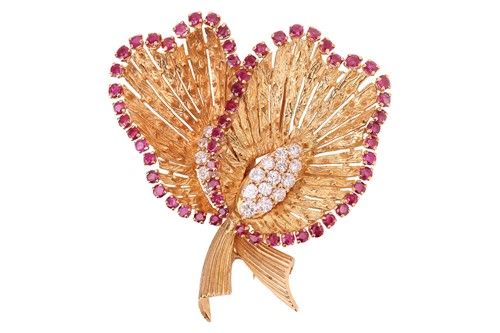 Lot 101 - A gem-set calla lily brooch, two stylised...