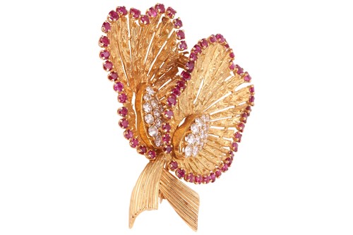Lot 101 - A gem-set calla lily brooch, two stylised...