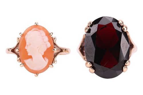 Lot 76 - A garnet dress ring in 9ct gold, size M½; and...