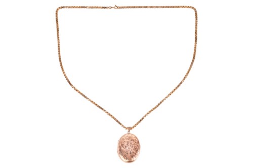 Lot 124 - A 9ct locket and chain, the oval locket with...