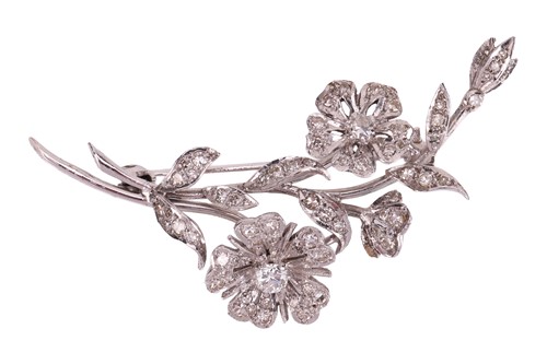 Lot 128 - A diamond floral brooch, composed of two...