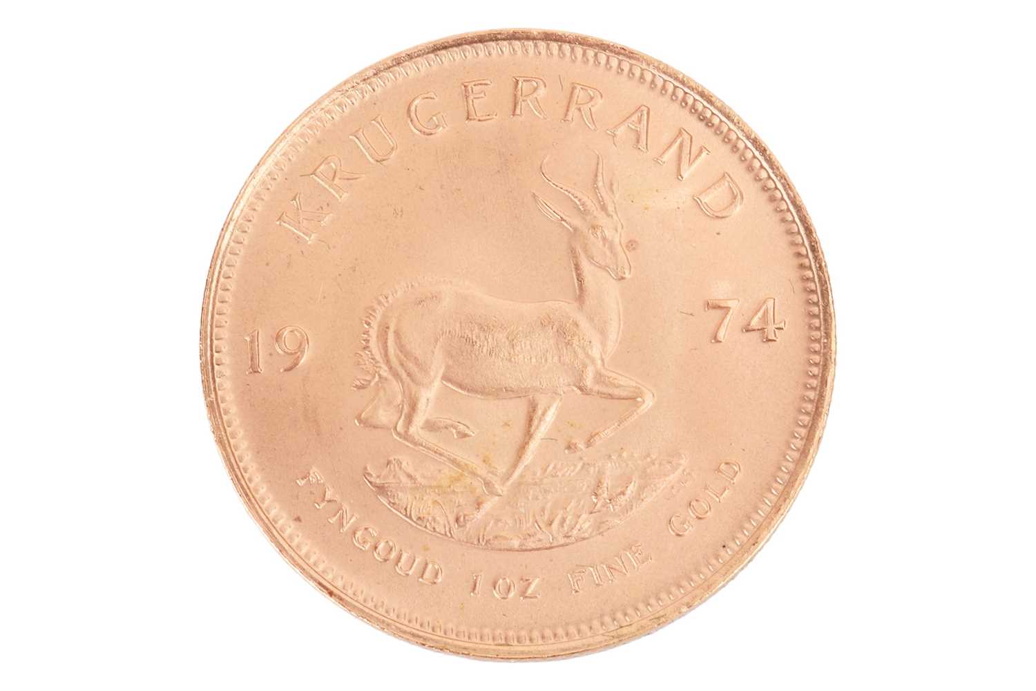 Lot 233 - A South African 1oz gold Krugerrand, dated 1974.