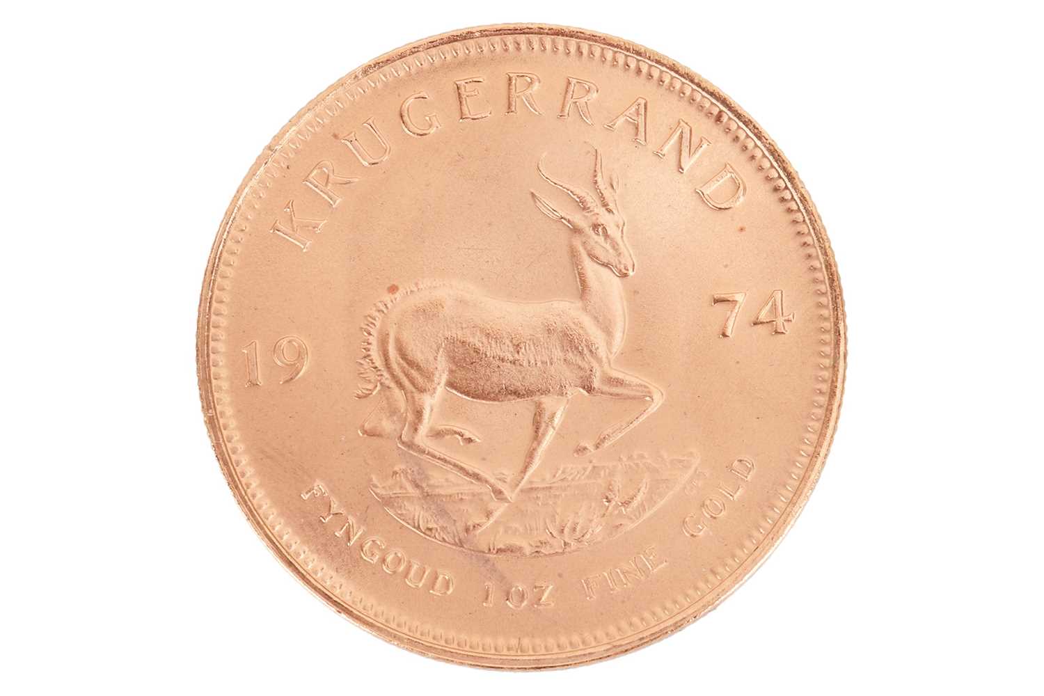 Lot 261 - A South African 1oz gold Krugerrand, dated 1974.