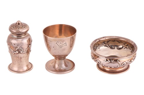 Lot 299 - A silver egg cup by Wakely & Wheeler, a...