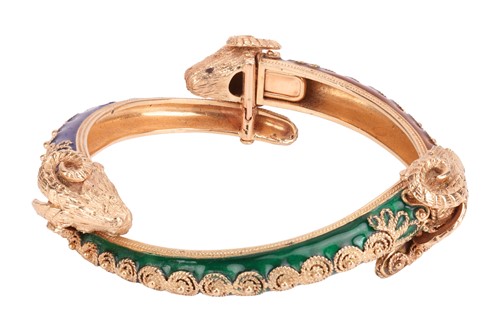 Lot 93 - A bangle and a ring of rams head motif design,...