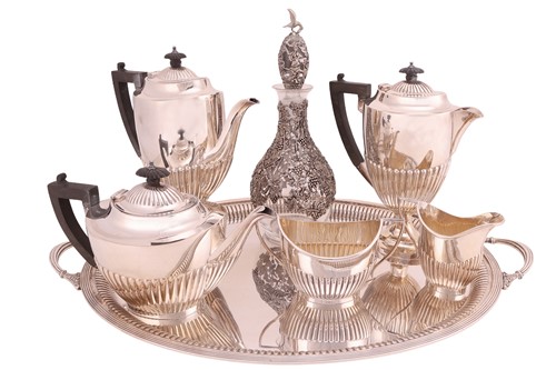 Lot 282 - A silver-plated five-piece tea service on tray,...