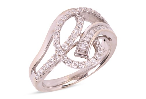Lot 138 - A diamond-set dress ring, of scrolling design,...