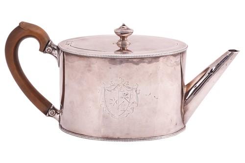 Lot 329 - A George III silver teapot of oval cylindrical...