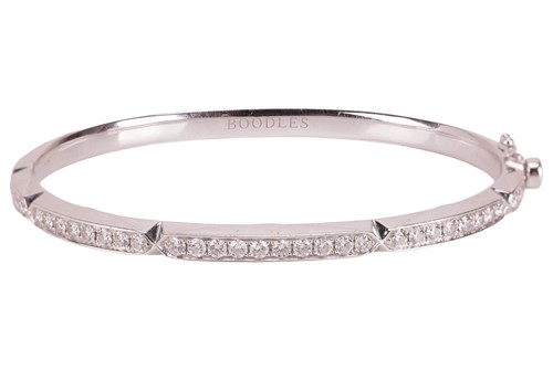Lot 186 - Boodles - A diamond-set hinged bangle,...