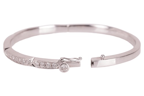 Lot 186 - Boodles - A diamond-set hinged bangle,...