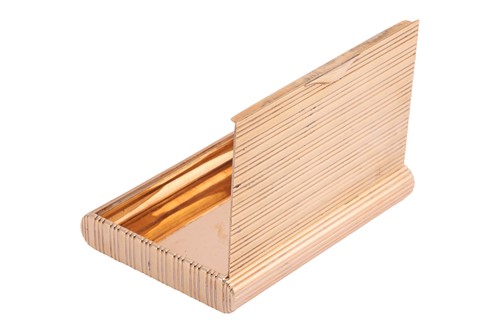 Lot 258 - A cigarette case in 14ct gold, of reeded...