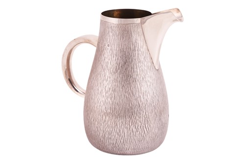 Lot 262 - Gerald Benney - a silver water jug, of...