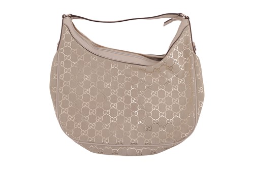 Lot 349 - Gucci - a 'Charmy' hobo bag in beige GG suede...