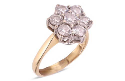 Lot 114 - A diamond cluster ring, of bi-coloured design,...
