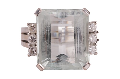 Lot 125 - An aquamarine and diamond ring, the claw-set...