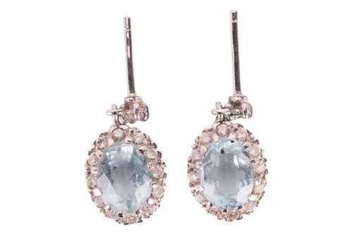 Lot 121 - A pair of aquamarine and diamond cluster...