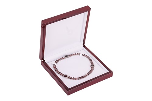 Lot 200 - A garnet and diamond collar necklace, composed...