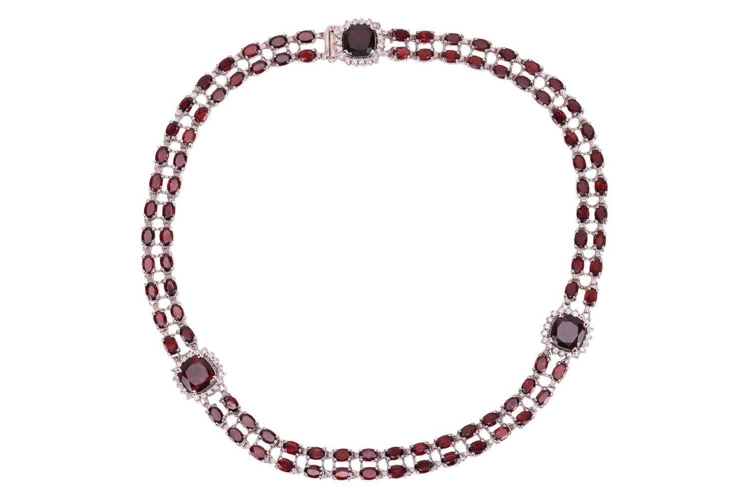 Lot 200 - A garnet and diamond collar necklace, composed...