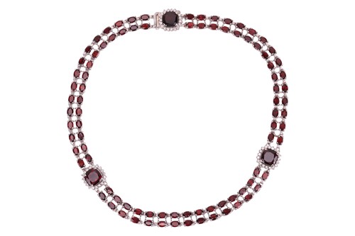 Lot 200 - A garnet and diamond collar necklace, composed...