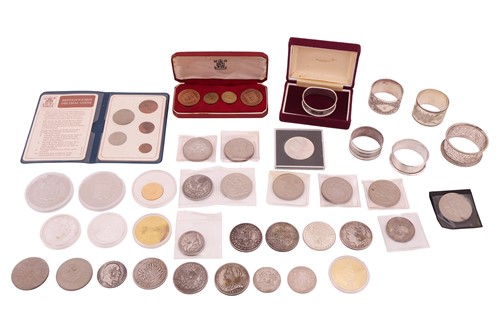 Lot 280 - A group lot of coins; to include four 1977...