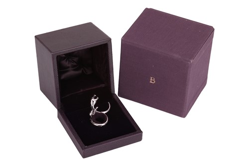 Lot 186 - Boucheron - A diamond-set 'Kaa Double Trouble'...