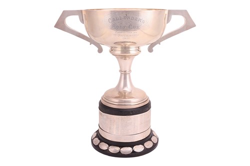 Lot 366 - An Art Deco twin-handled silver trophy cup,...