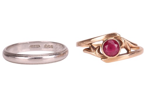 Lot 109 - Two rings, including a circular-cut synthetic...