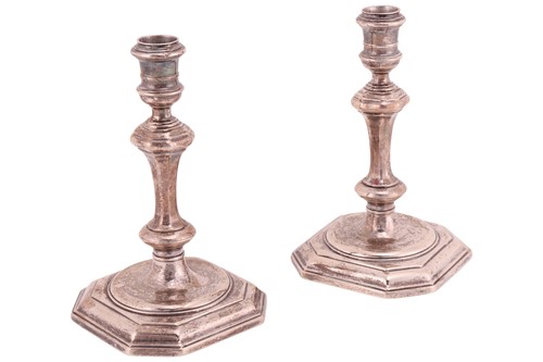Lot 313 - A pair of George I silver cast candlesticks,...