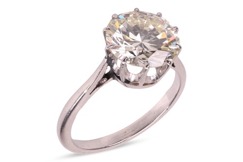 Lot 205 - A round brilliant-cut diamond solitaire ring,...