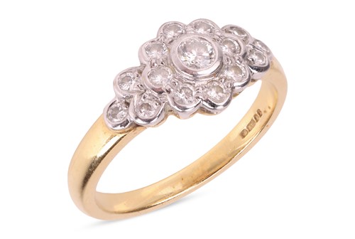 Lot 180 - A diamond cluster ring, of bi-coloured design,...