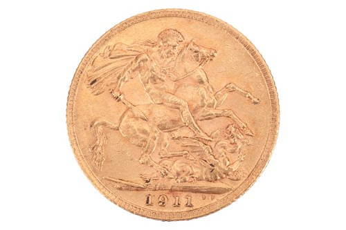 Lot 232 - A 1911 George V full sovereign, 8.0 grams.