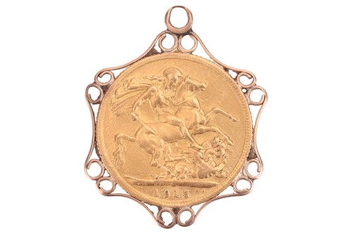 Lot 234 - A 1915 George V full sovereign, in a scrolled...