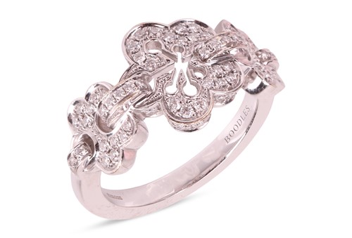 Lot 193 - Boodles - A diamond-set Blossom Triple ring,...