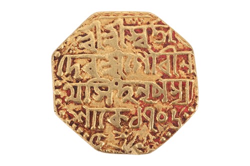 Lot 195 - An octagonal Mohur coin, 11.2 grams.