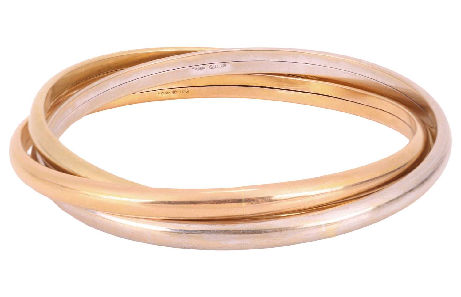 Lot 125 - An 18ct gold tri colour bangle, consisting of...