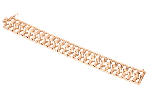Lot 163 - An 18ct gold bracelet, consisting of wide...