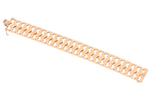 Lot 163 - An 18ct gold bracelet, consisting of wide...